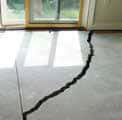 concrete floor with large crack in it