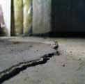 concrete floor with large crack in it